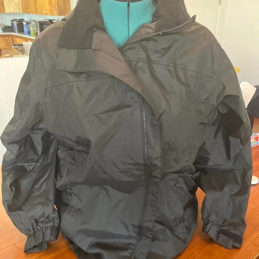 Black and grey waterproof jacket with removable hood